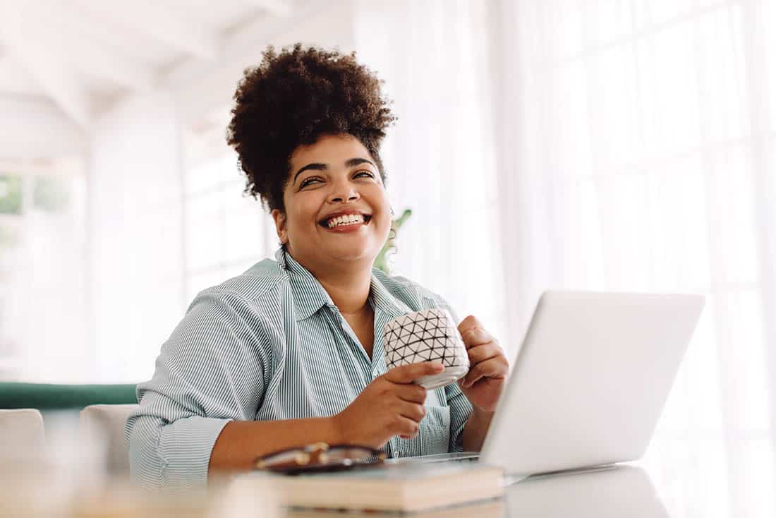 Woman taking break while working from home contactUs Callout 1 1100x734 1